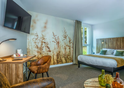 Grande chambre à l'hôtel les Jardins de l'Anjou